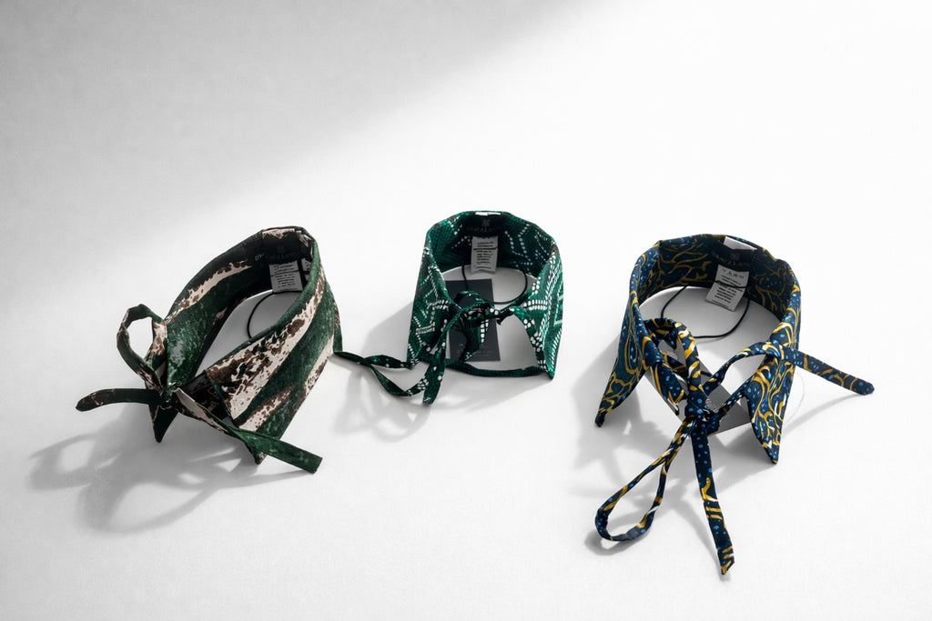 A graceful detachable collar adorned with geometric motifs, perfect for enhancing outfits with effortless elegance.