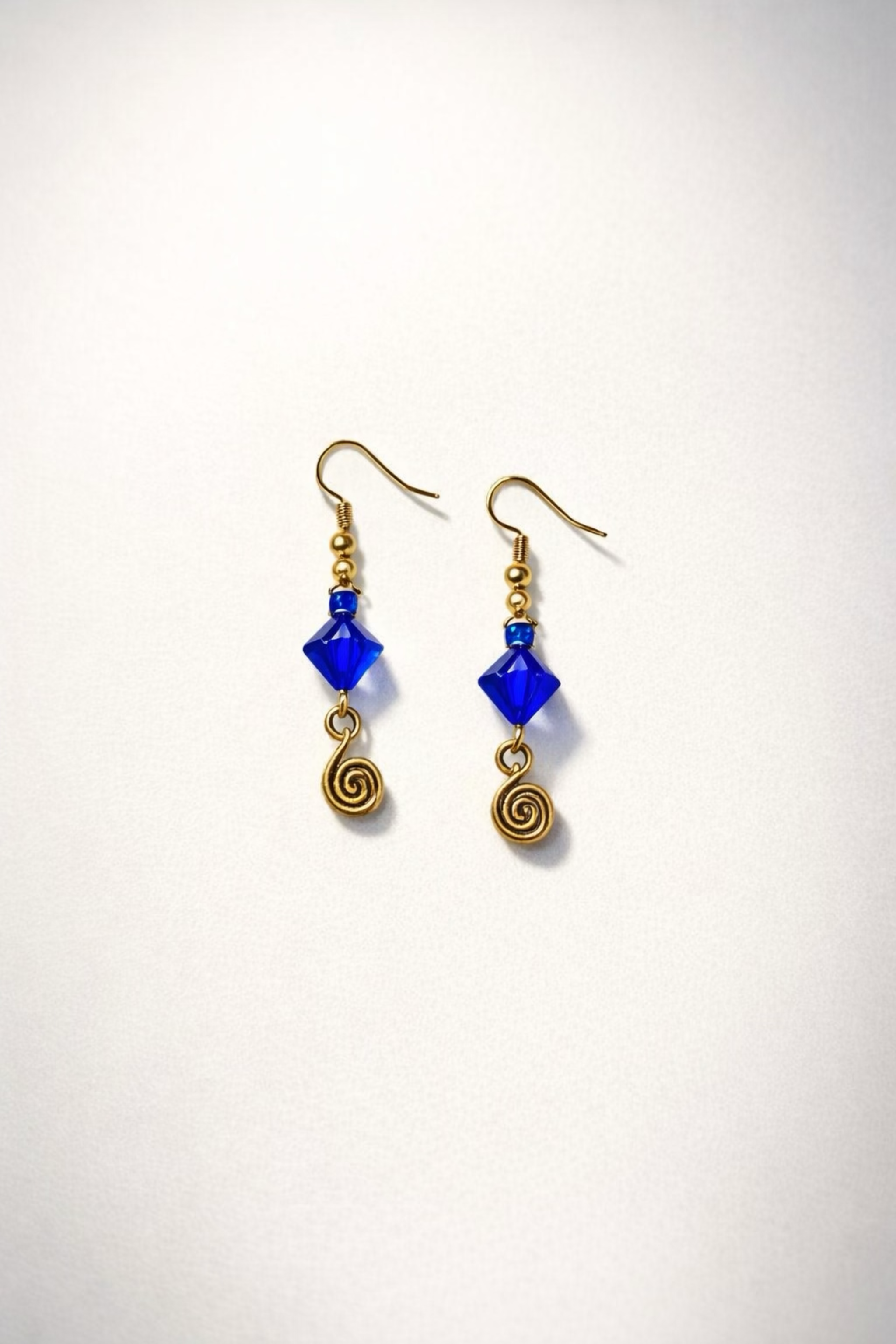 ETYANG’ COBALT SPIRAL DROP EARRINGS