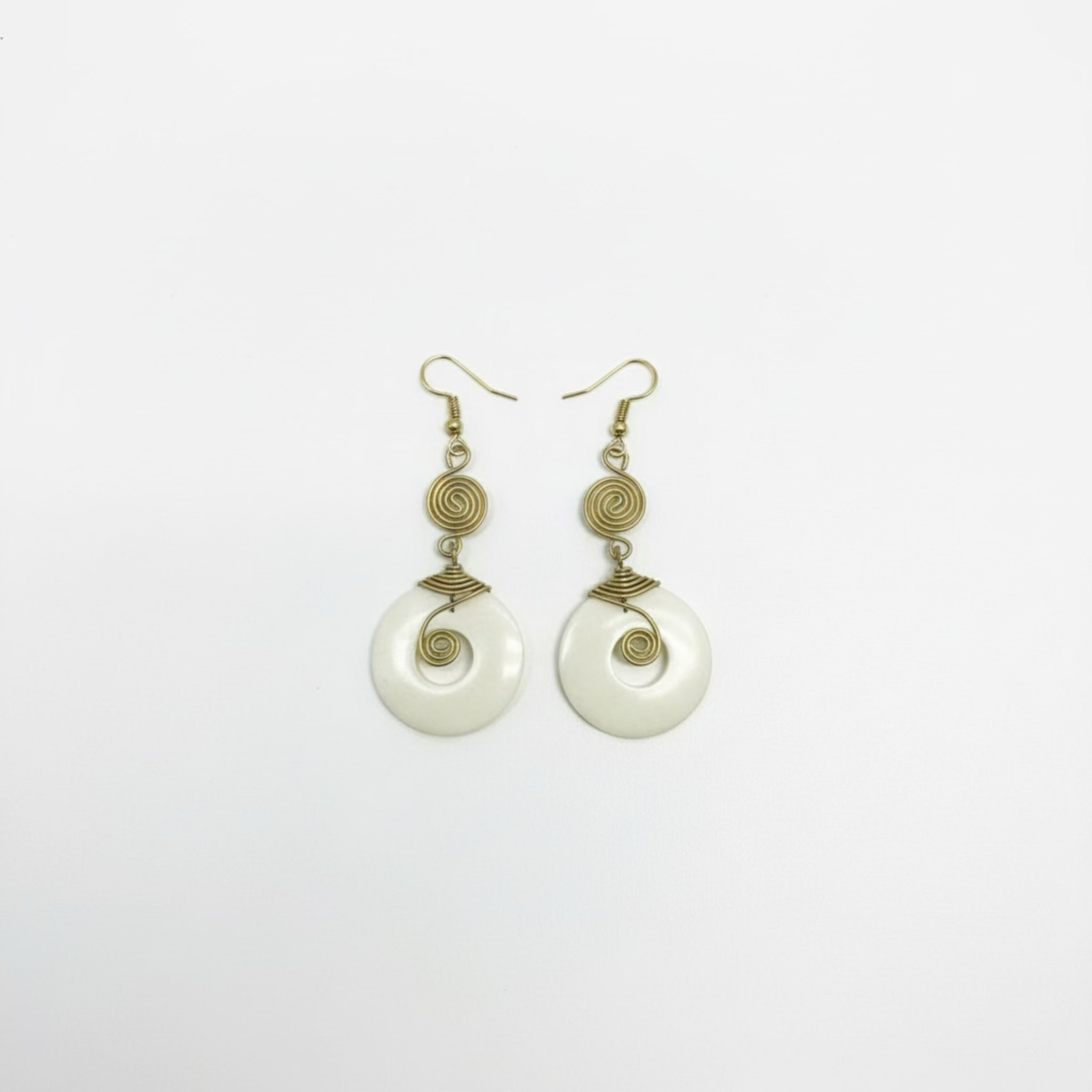 Elegant drop earrings crafted from brass with a wire-wrapped design and a hook closure, featuring a symbolic charm that enhances their timeless appeal.