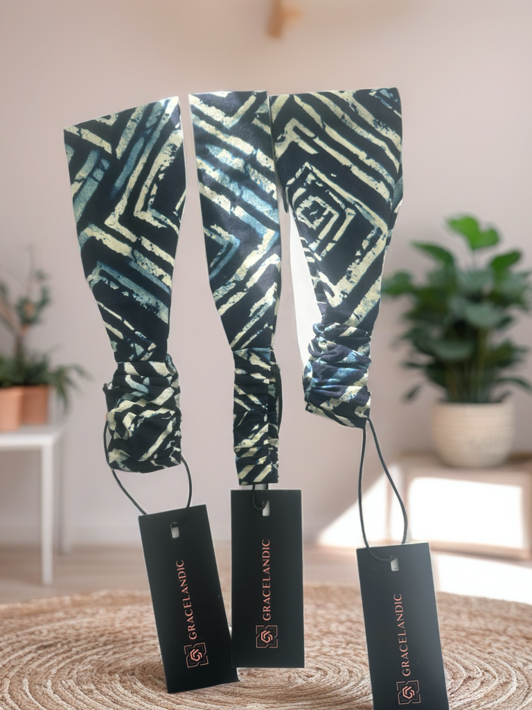 An elegant headband featuring geometric motifs and a soft wrap design.
