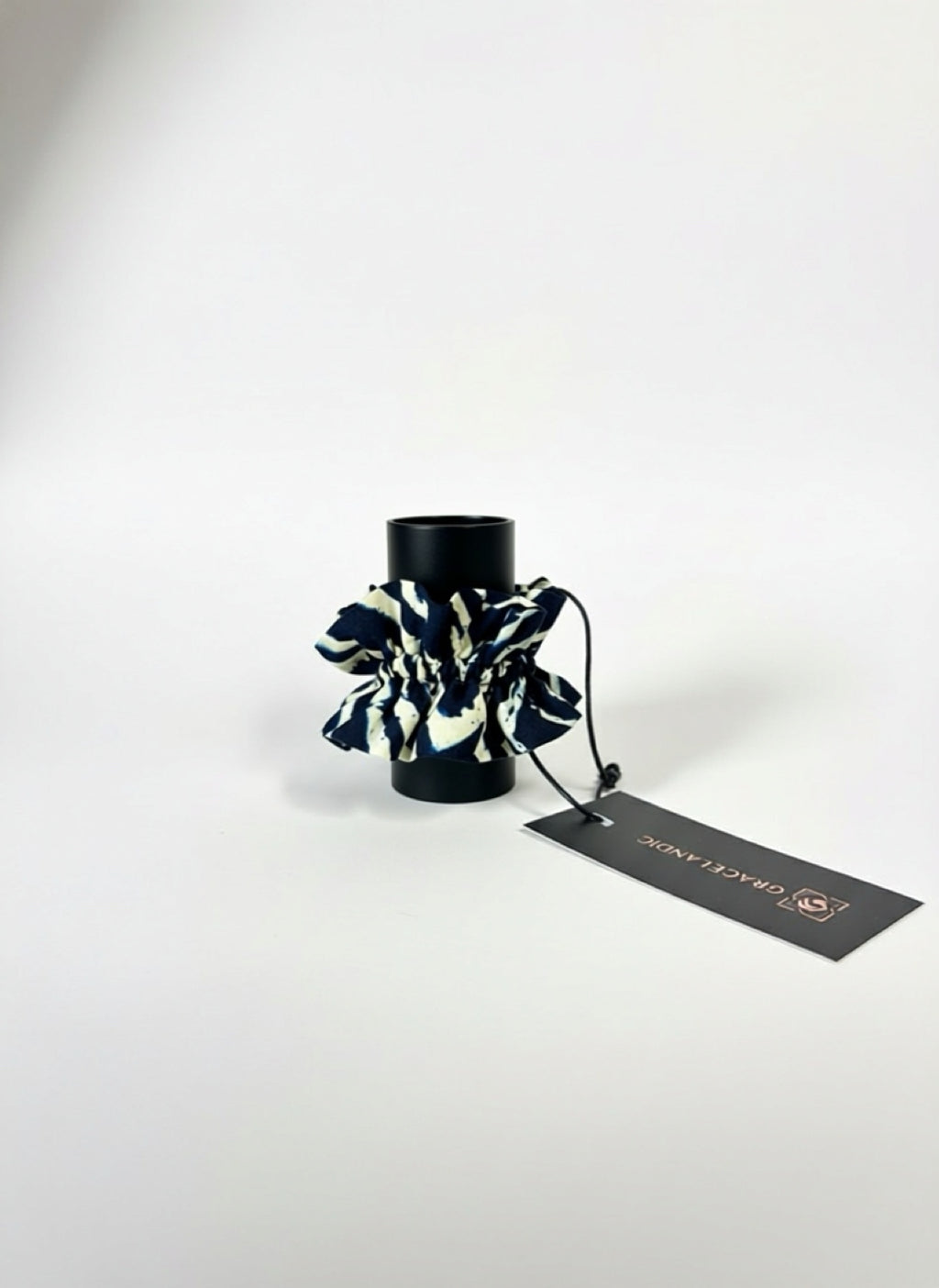 A versatile wrist band featuring an abstract pattern, designed for easy styling and movement.