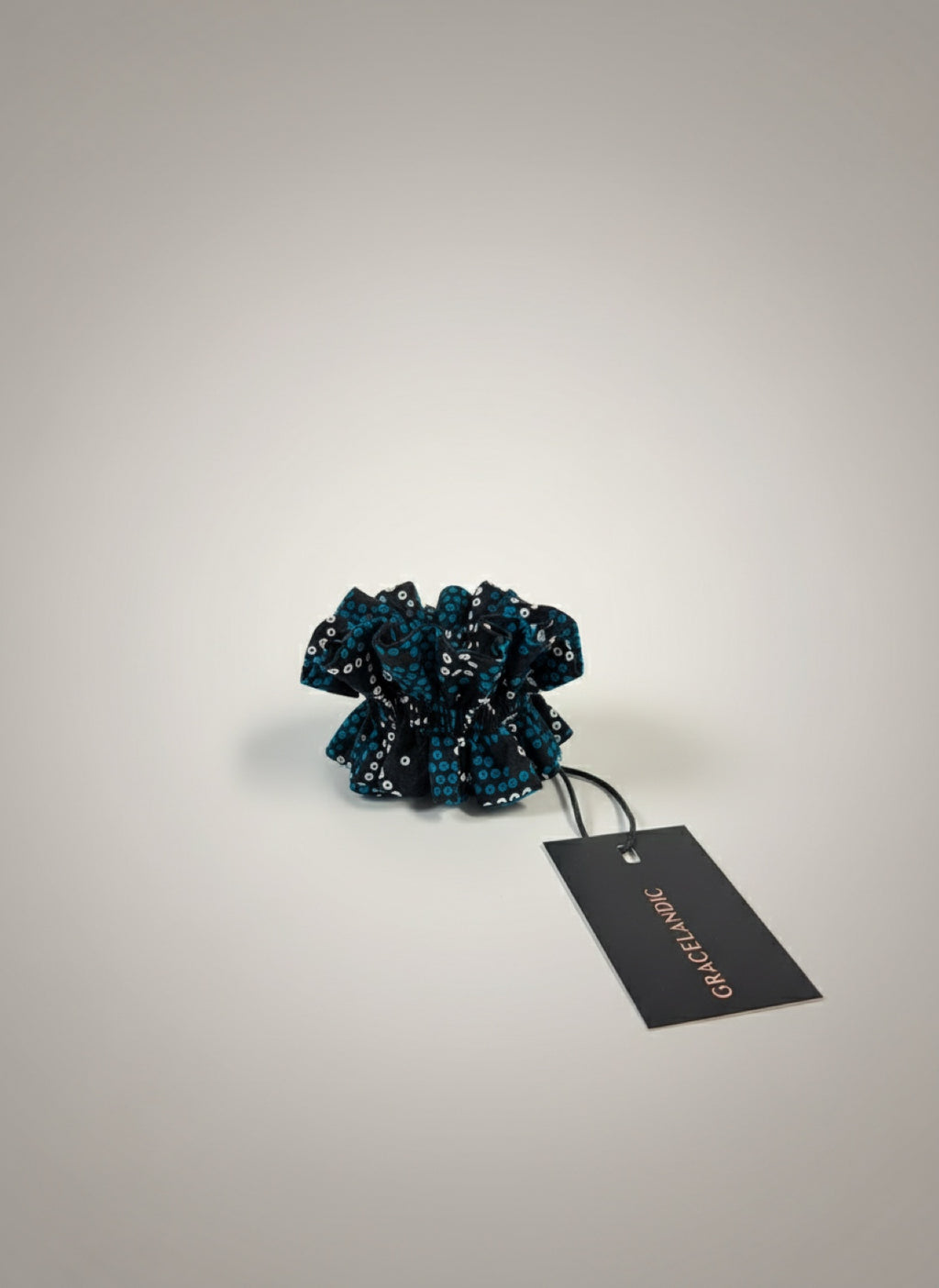 A versatile wrist band featuring an abstract pattern, designed for easy styling and movement.
